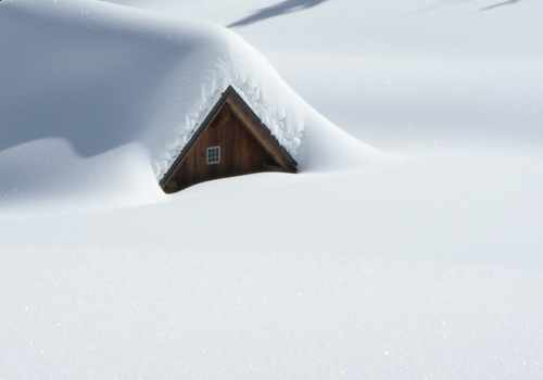 roof covered with snow- should-you-remove-snow-from-your-roof