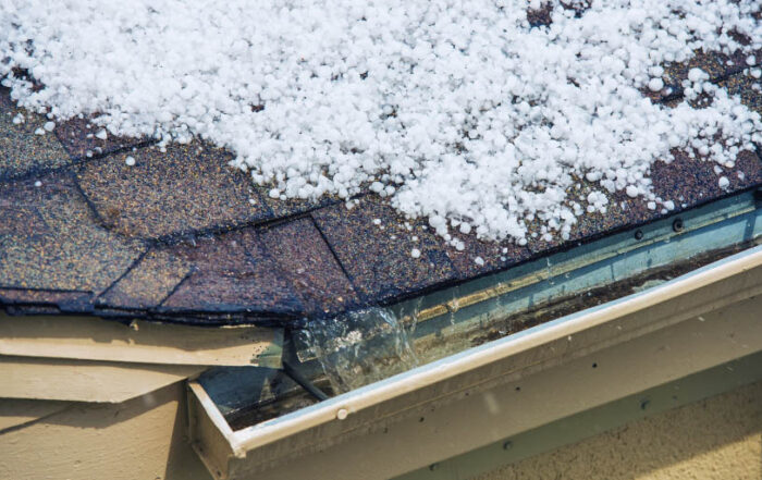 Snow on a Roof in Ankeny, IA- Emergency Roofing Repair in Winter